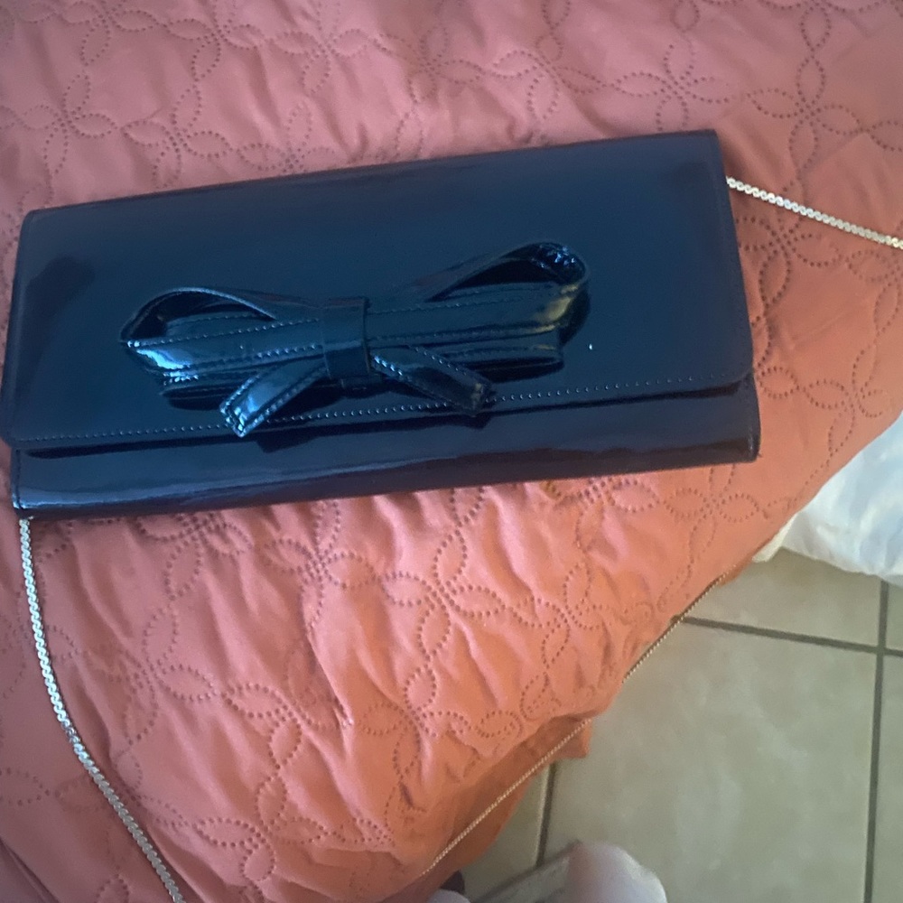 Black shiny Valentino clutch with silver chain